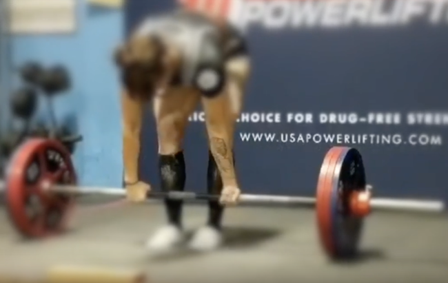 girl deadlifting a lot of weight